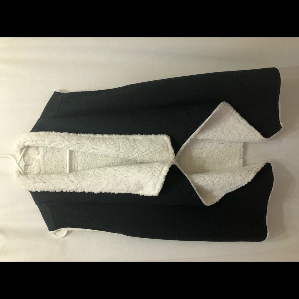 Reversible charcoal and cream vest. NWT